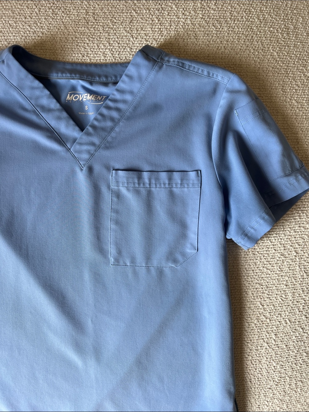 Scrub Set Top and Pants. Movement Buttersoft. Top and bottoms men’s size Small.